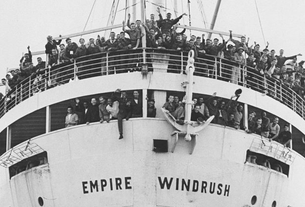 An image of Jamaican immigrants arriving at Tilbury Dock in 1948 on the Empire Windrush.