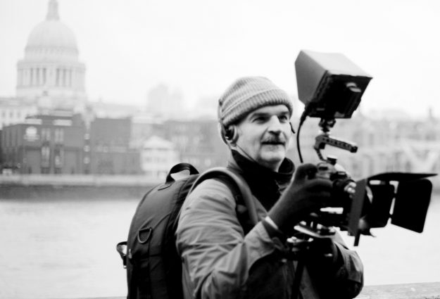 Picture of Fotis Begkis with his camera, with Saint Paul's Cathedrale in the background